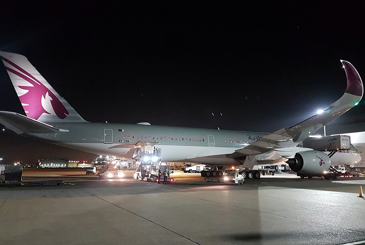 A7-ANA at London Heathrow at night in April 2018